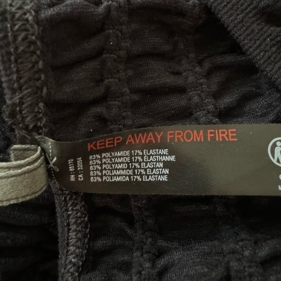 ANTHROPOLOGIE Seamless Smocked Black Mini Skirt Size L/XL NEW - Picture 5 of 6